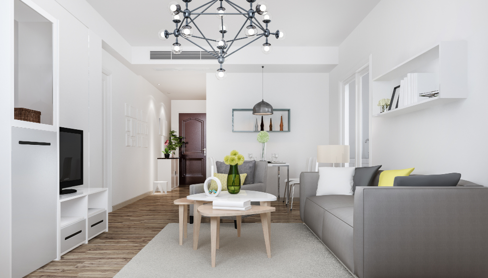 Ambiente unico con soggiorno moderno e illuminazione accesa